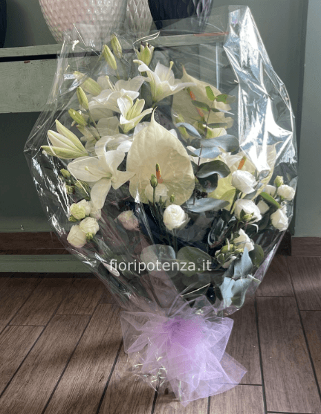 MAZZO FUNEBRE CON FIORI BIANCHI A SCELTA DEL FIORISTA 